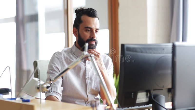 Happy creative team with computers in office stock footage