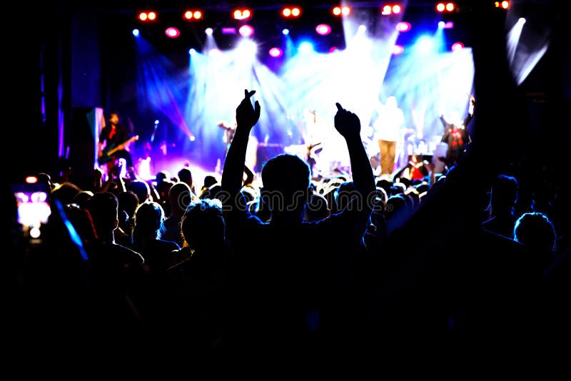 Happy Crowd with Raised Hands at a Rock Concert. Stock Photo - Image of ...