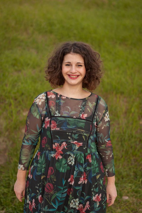 Happy Curvy Girl With Curly Hair In The Landscape Stock Image Image