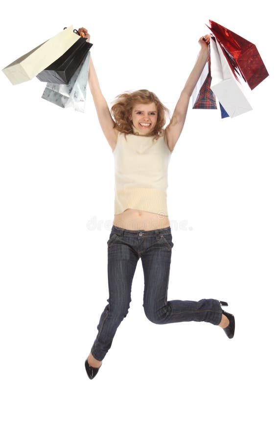 Happy dancing blonde holds paper bags