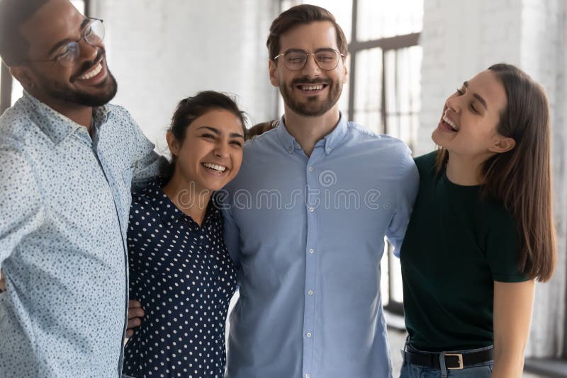 Happy diverse business team celebrating corporate success together