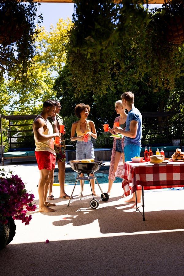 Happy Diverse Group Of Friends Having Pool Party Barbecuing In Garden Stock Image Image Of