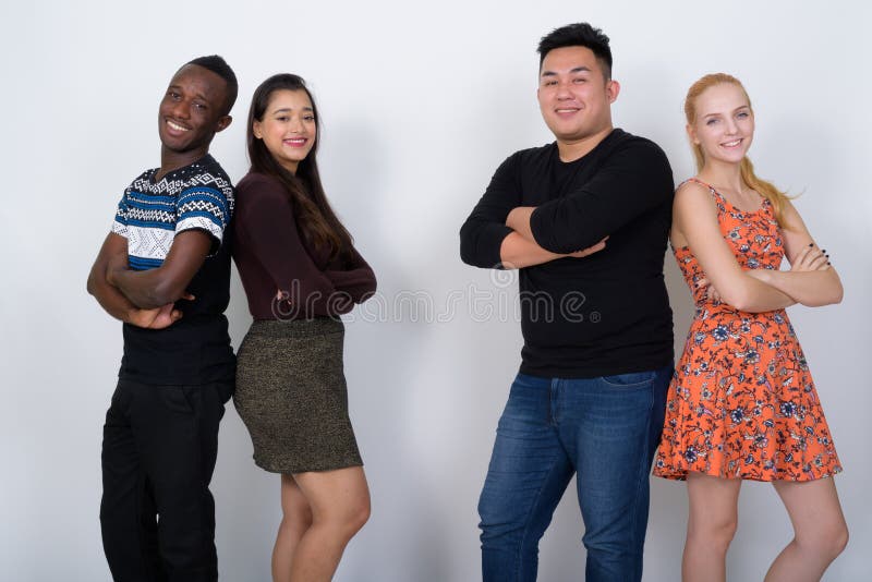Happy diverse group of multi ethnic friends smiling with arms cr royalty free stock photos Happy diverse group of multi ethnic friends smiling with arms cr royalty free stock photos