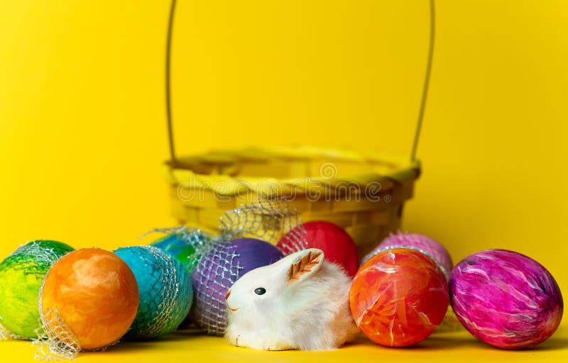 Happy Easter Colorful, Handpainted, Pastel Easter Eggs on a Yellow