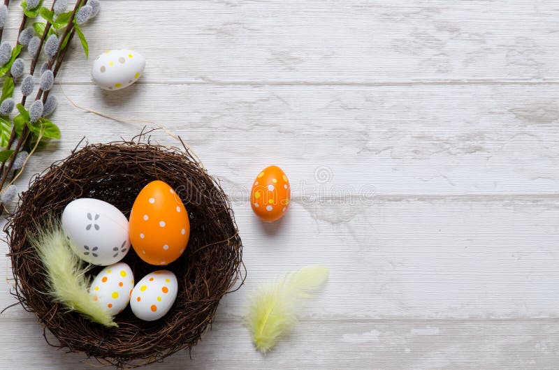 Happy easter decoration background, eggs in the nest stock photo