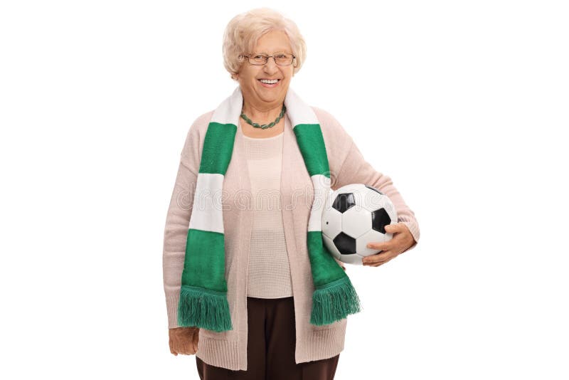 Happy elderly soccer fan with a scarf and a football