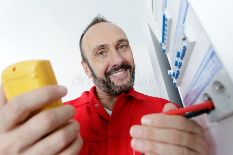 Happy electrician engineer worker royalty free stock images
