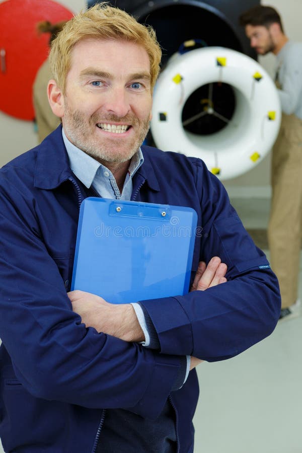 Happy engineer accurate project plan stock photo