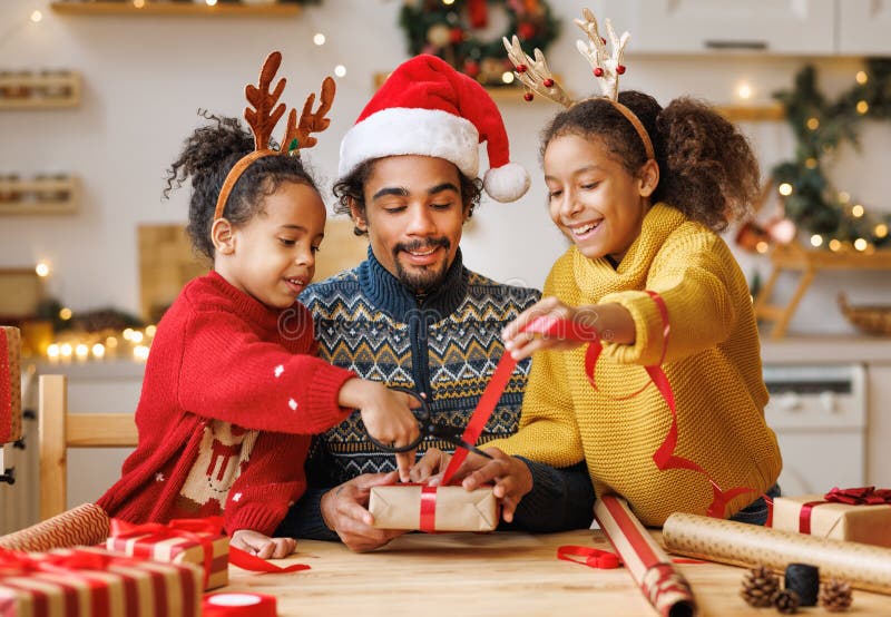 Happy African American Family Father Kids Daughter Son Pack Christmas Stock  Photo by ©evgenyataman 624194704