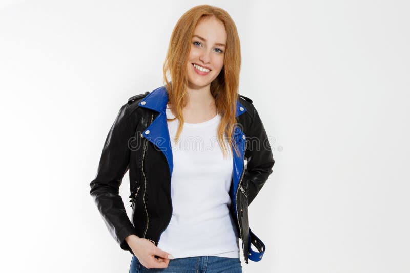 Happy Excited Young Woman in white t shirt and black leather jacket isolated on white background. Red hair girl in fashion clothes royalty free stock photography Happy Excited Young Woman in white t shirt and black leather jacket isolated on white background. Red hair girl in fashion clothes royalty free stock photography