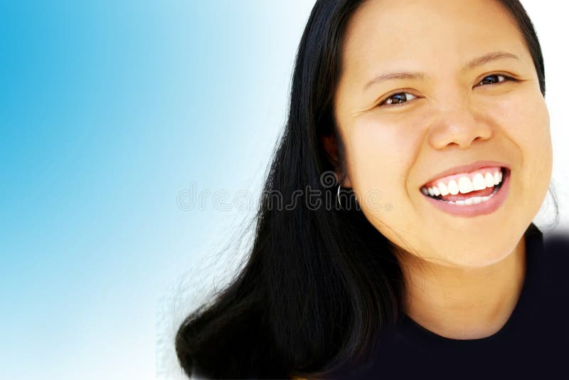 Happy and laughing asian beauty with shoulder length black hair and enough copy space. Fit for big smile, surprise, bright future, dentist, dental care, etc. concept or lay-out. Happy and laughing asian beauty with shoulder length black hair and enough copy space. Fit for big smile, surprise, bright future, dentist, dental care, etc. concept or lay-out.