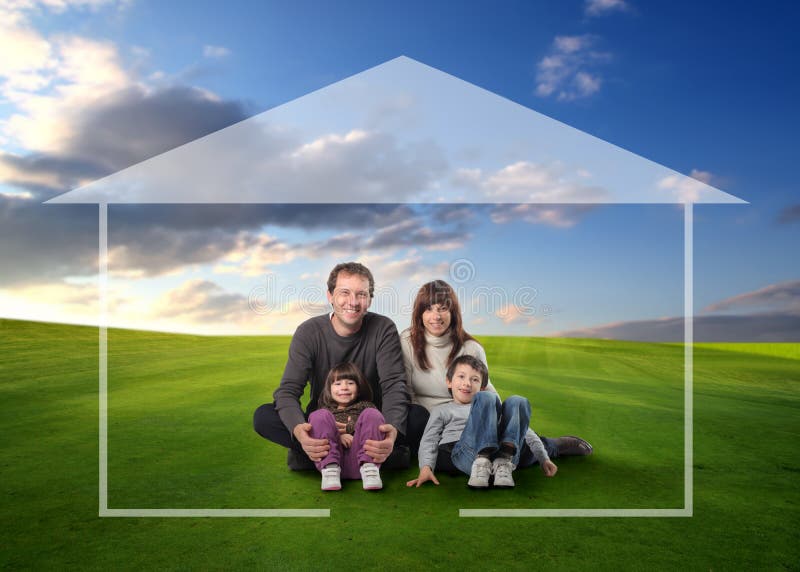 Happy family seated in a grass field and surrounded by home drawing