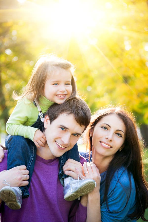 Happy family in autumn park stock photography Happy family in autumn park stock photography