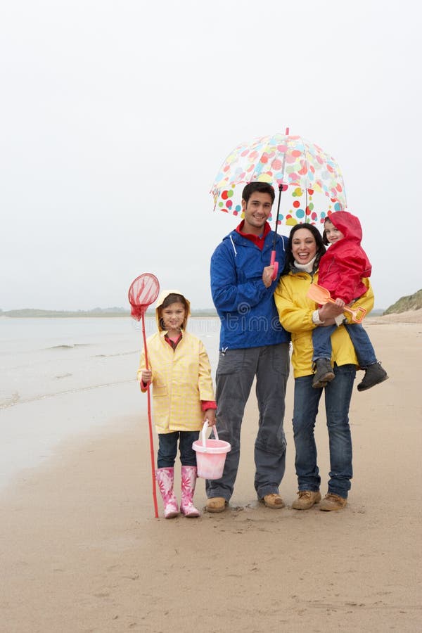 Happy Family on Beach with Umbrella Stock Photo Image of vacation