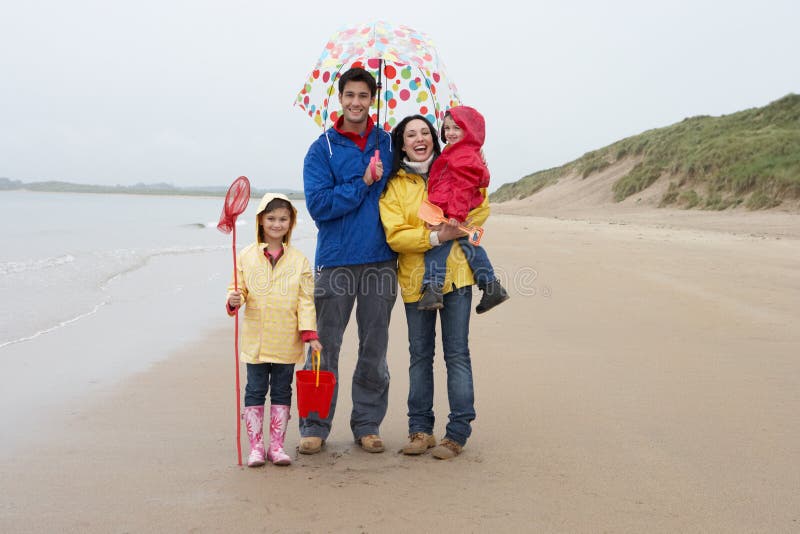 Happy Family on Beach with Umbrella Stock Photo Image of camera