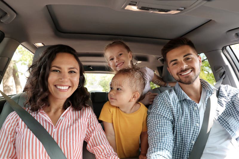 Happy family in car on road trip. Happy family in car on road trip