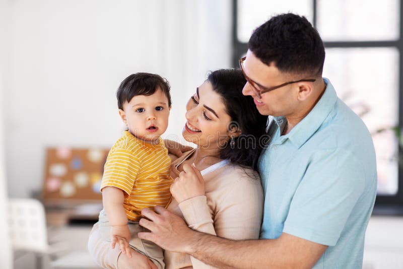 Happy family with child at home