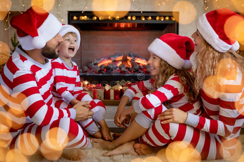 Family near fireplace stock photo. Image of legs, autumn - 61613052