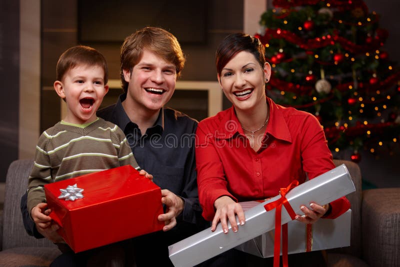 Happy family with christmas gifts royalty free stock images Happy family with christmas gifts royalty free stock images