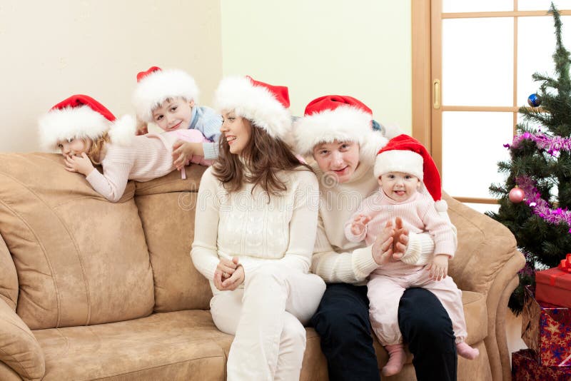 Happy family on Christmas in living room