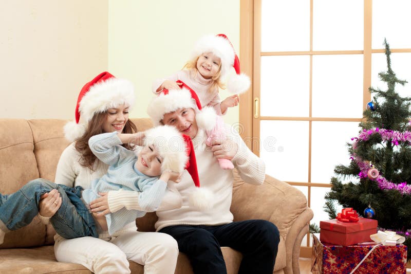 Happy family on Christmas in living room