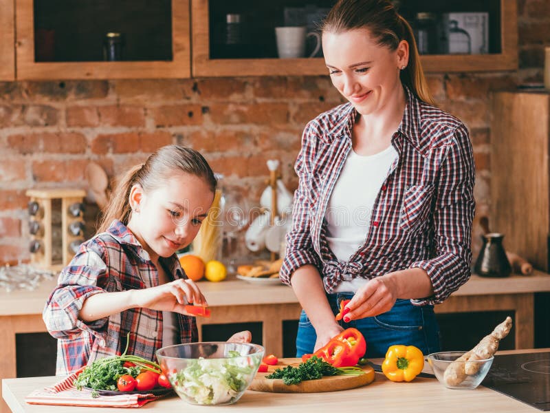 Happy family cooking healthy homemade food