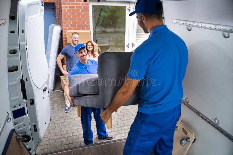 Happy Family Couple Watching Movers Unload Furniture