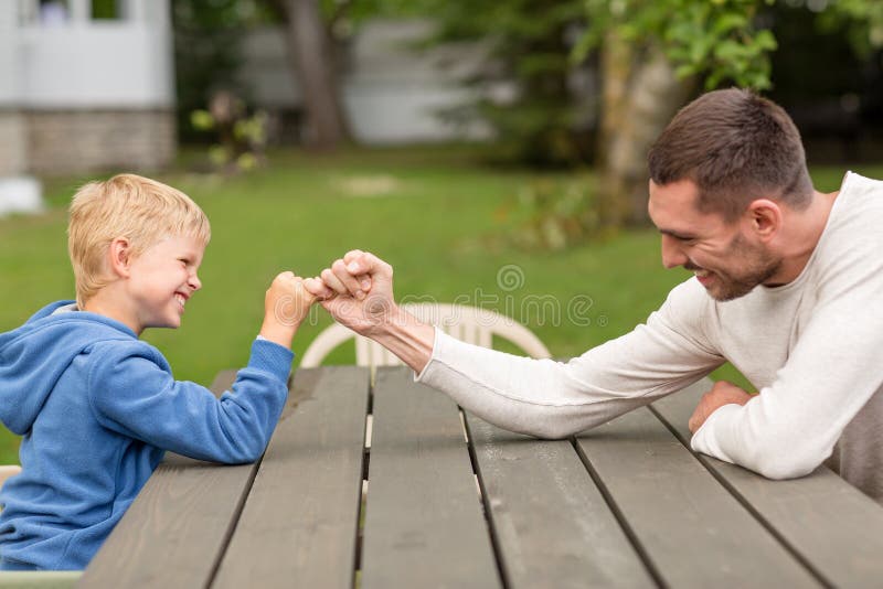 Happy family in front of house outdoors stock photography Happy family in front of house outdoors stock photography