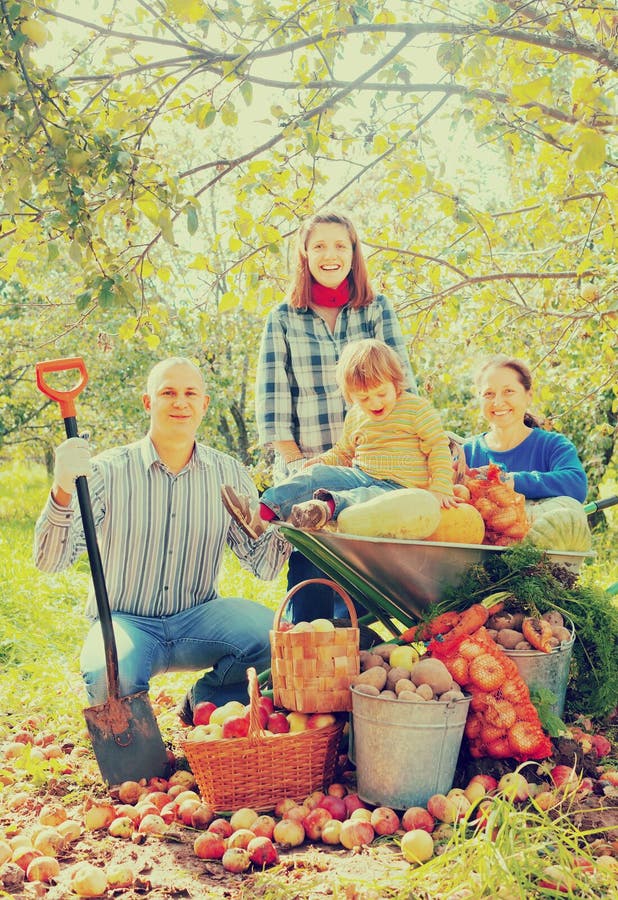 Happy family in garden stock image. Image of male, baby - 79840703