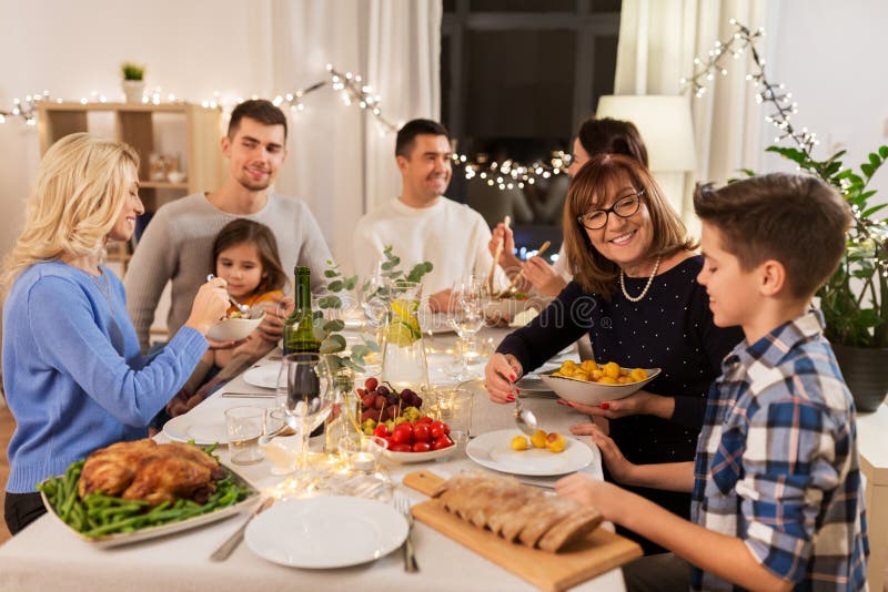 Happy Family Having Dinner Party at Home Stock Photo - Image of holiday