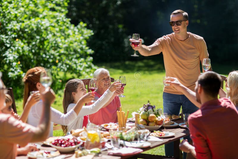 Happy Family Having Dinner or Summer Garden Party Stock Image - Image