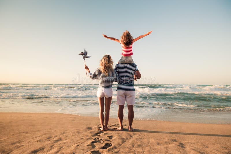 Happy family having fun on summer vacation stock image Happy family having fun on summer vacation stock image