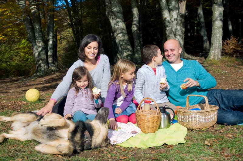 Happy family having picnic royalty free stock photo Happy family having picnic royalty free stock photo