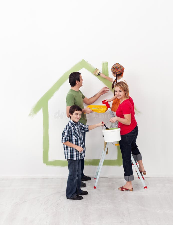 Happy family with kids redecorate their new home stock images Happy family with kids redecorate their new home stock images