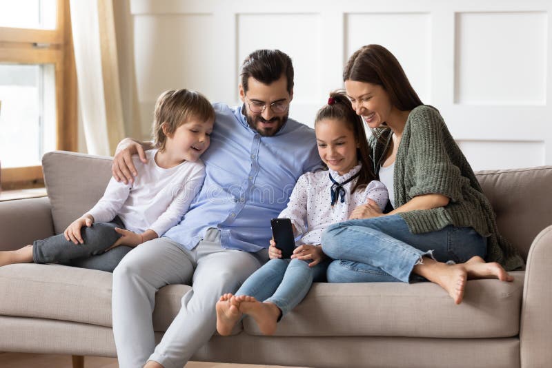 Happy Family with Kids Relax at Home Using Cellphone Stock Photo - Image of  cellular, device: 203600196