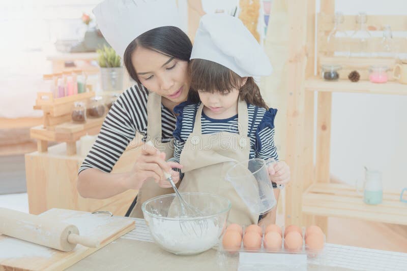 Happy family in the kitchen. Chef, cute.