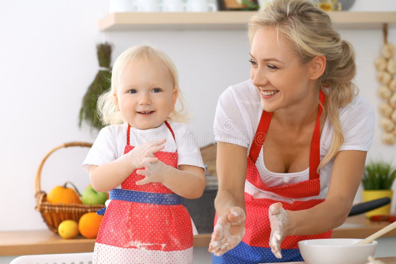 Happy Family in the Kitchen. Mother and Child Daughter Cooking Holiday ...