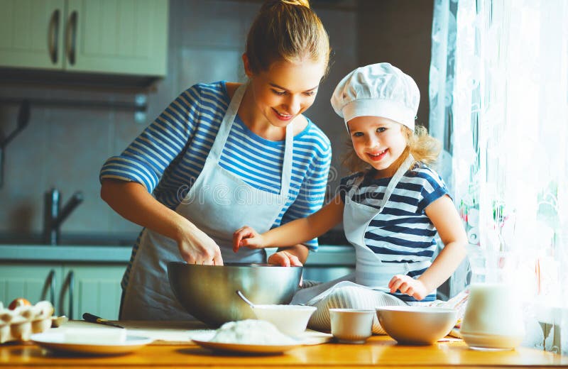 Happy Family in Kitchen. Mother and Child Preparing Dough, Bake Stock ...