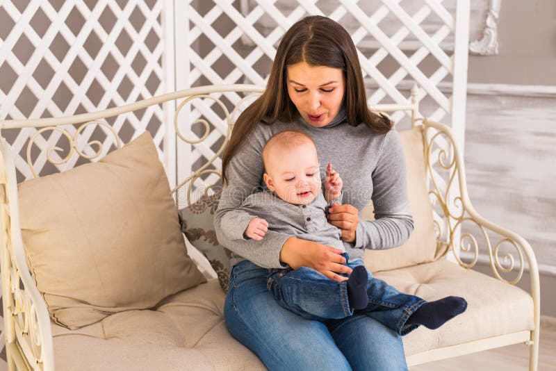 Faces Mother with Baby on Sunset Stock Photo - Image of lifestyle ...