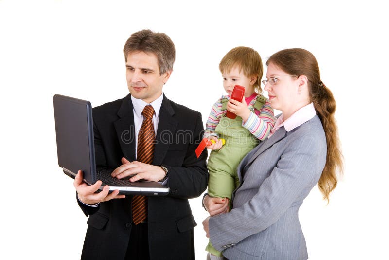 Happy family looking into the screen of laptop