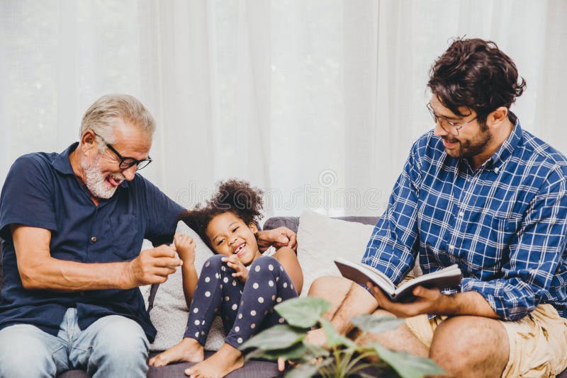 Happy family moment elder with child little girl and son at home living room happiness moment royalty free stock photos Happy family moment elder with child little girl and son at home living room happiness moment royalty free stock photos