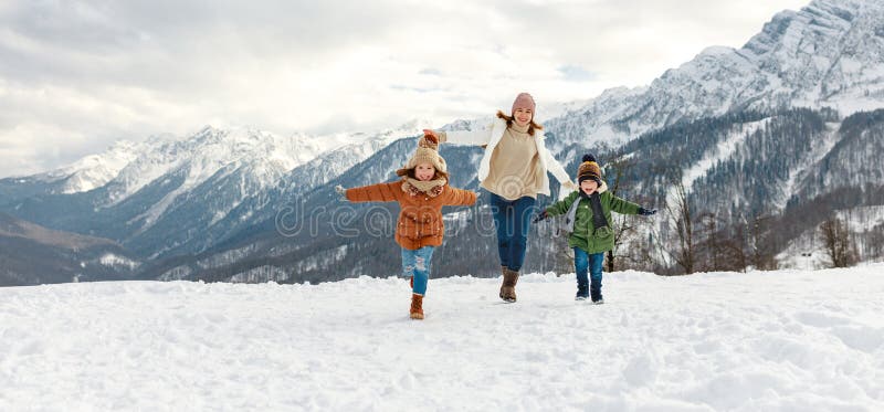 Happy family mother and children having fun on winter walk royalty free stock photo Happy family mother and children having fun on winter walk royalty free stock photo