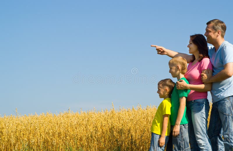 Happy family on the nature