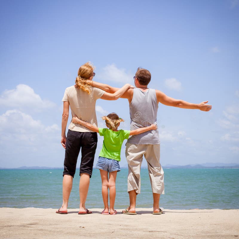 Happy Family Near the Beach Stock Image - Image of cheerful, sport