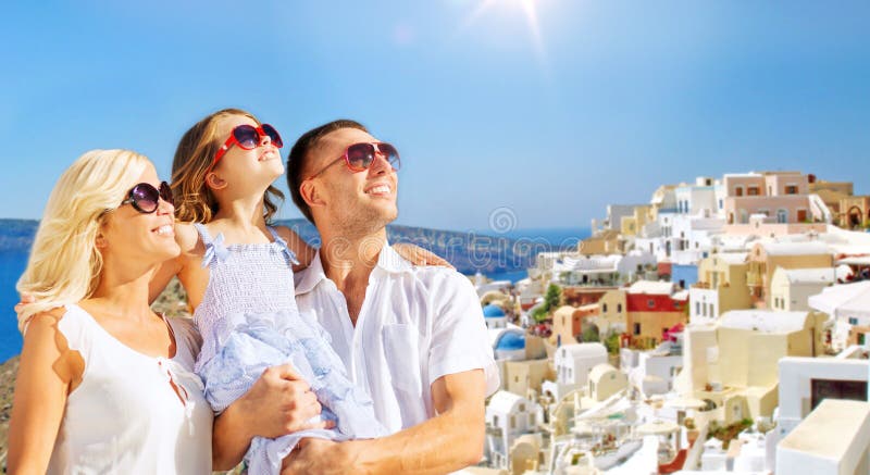 Happy family over santorini island background stock photography Happy family over santorini island background stock photography