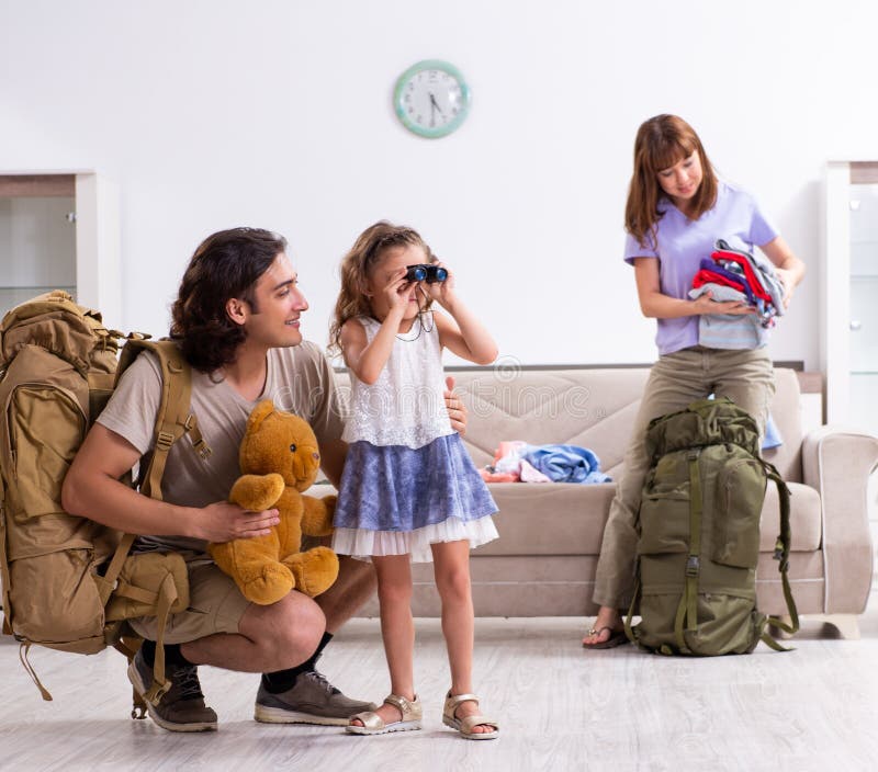 Happy Family Planning Vacation Trip Stock Photo Image of packing, backpacker 264242716