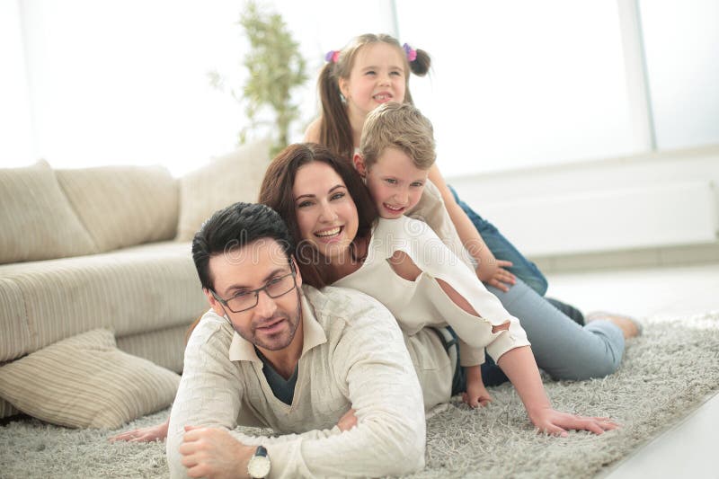 Happy family resting on a free evening .