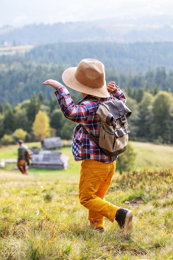 Happy family resting in the mountains in autumn stock photography