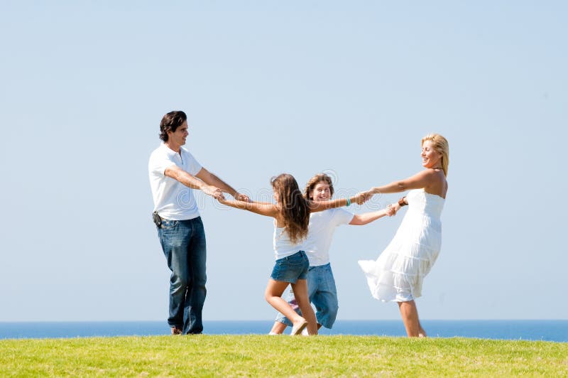 Happy family smiling and having fun outdoors