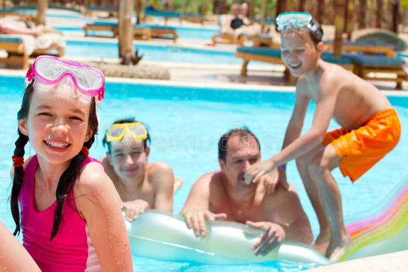 Happy Family In Swimming Pool Royalty Free Stock Images - Image: 20337999